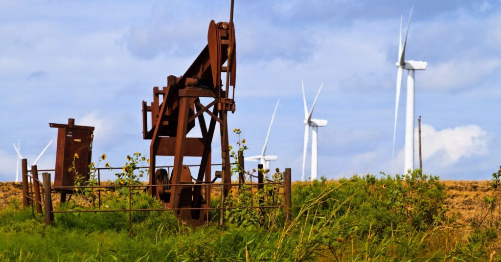 Picture of Texas landscape with windmills and oil drilling machine