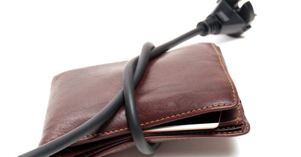 Picture of power cord around wallet