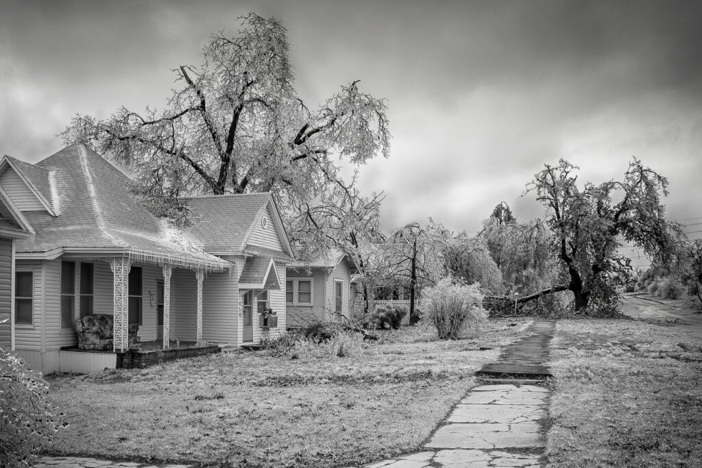 How to prepare for winter blackouts. Image of a house without power after a winter ice storm.