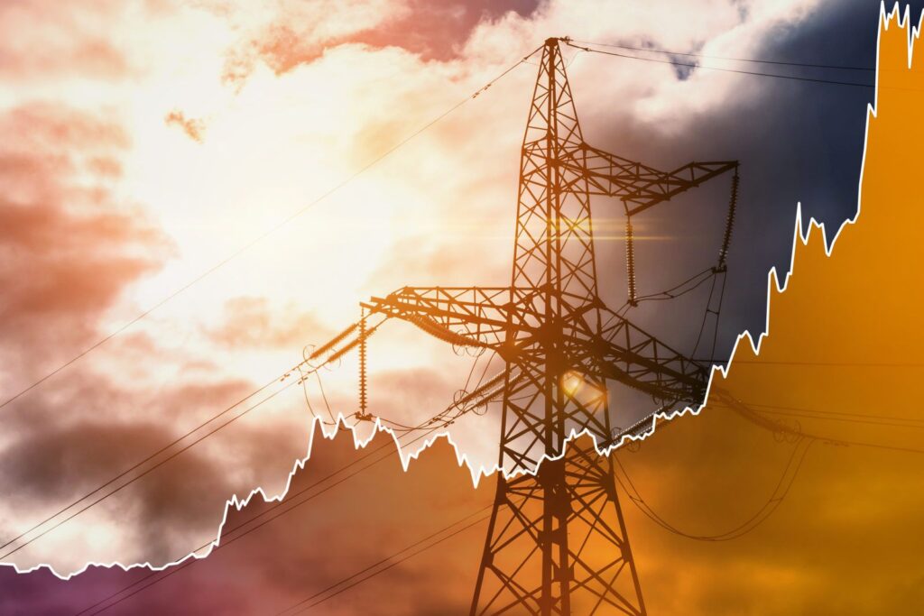 AEP Ohio is rate increase taking effect June 1st, 2023. Picture of an electricity transmission tower with a spiking rate chart overlayed.