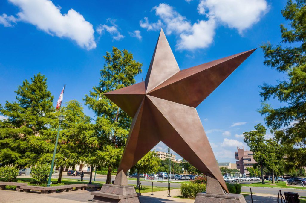 When is electricity cheapest in Texas? We dive into the factors influencing electricity cost in Texas. Photo of Texas star monument.