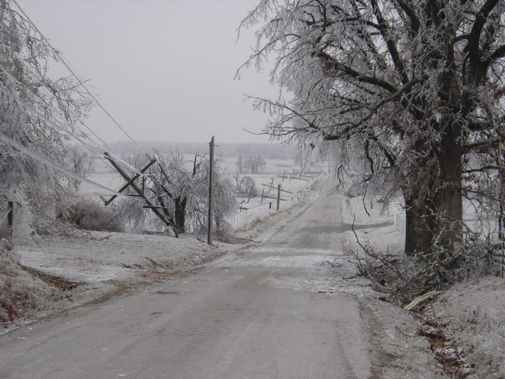 Why does Texas suffer from so many power outages? Photo of downed power lines after an ice storm.