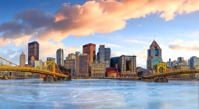 News release about the upcoming Duquesne electricity rate increase in June 2025. Skyline of downtown Pittsburgh at twilight panorama