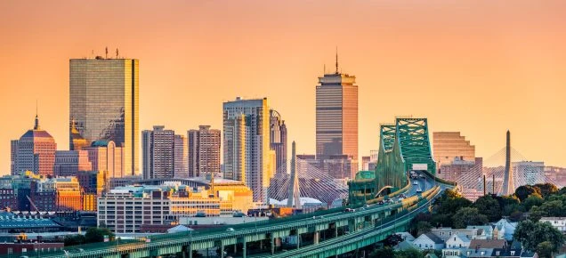 Default price to compare is increasing August 1, 2025 for Natioanl Grid. Photo of the Tobin bridge at sunset in Boston,MA.