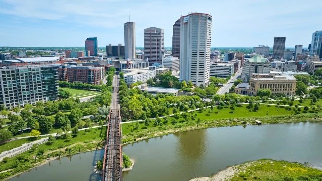 AEP Ohio is increasing their rate effective April 1, 2026. Photo is the city of Columbus, Ohio with an aerial view of American Electric Power skyscraper.